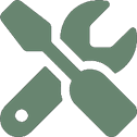 A green wrench and spanner icon on a black background.